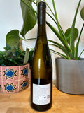 Back label of Szolo Frivolo natural wine bottle